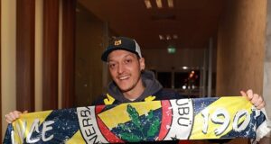 Ozil displays the Fernerbahce colors after completing his move to the Turkish side