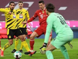 Emre Can and Thomas Meunier can do not to stop Robert Lewandowski from finishing at the far post