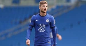 Timo Werner looks on in a chelsea shirt