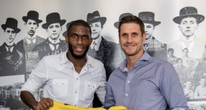 Anthony Modeste is presented with a BVB jersey number 20