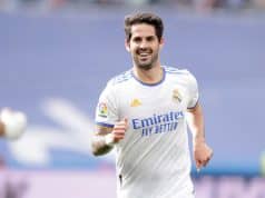 Isco looks excited in a Real Madrid jersey