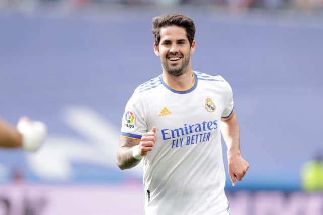 Isco looks excited in a Real Madrid jersey