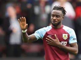 Maxwel Cornet in tears while donning a Burnley jersey