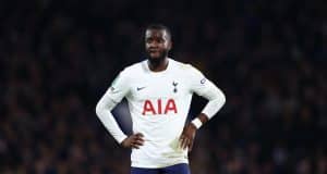 Tanguy Ndombele stands akimbo, visibly tired