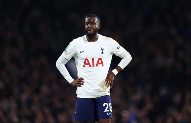 Tanguy Ndombele stands akimbo, visibly tired